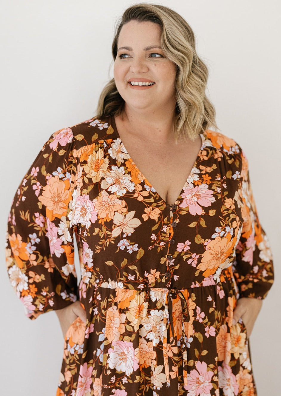 plus-size brown floral midi dress with drawstring waist and pockets