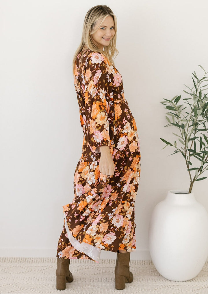 bump-friendly brown floral long-sleeved midi dress with pockets