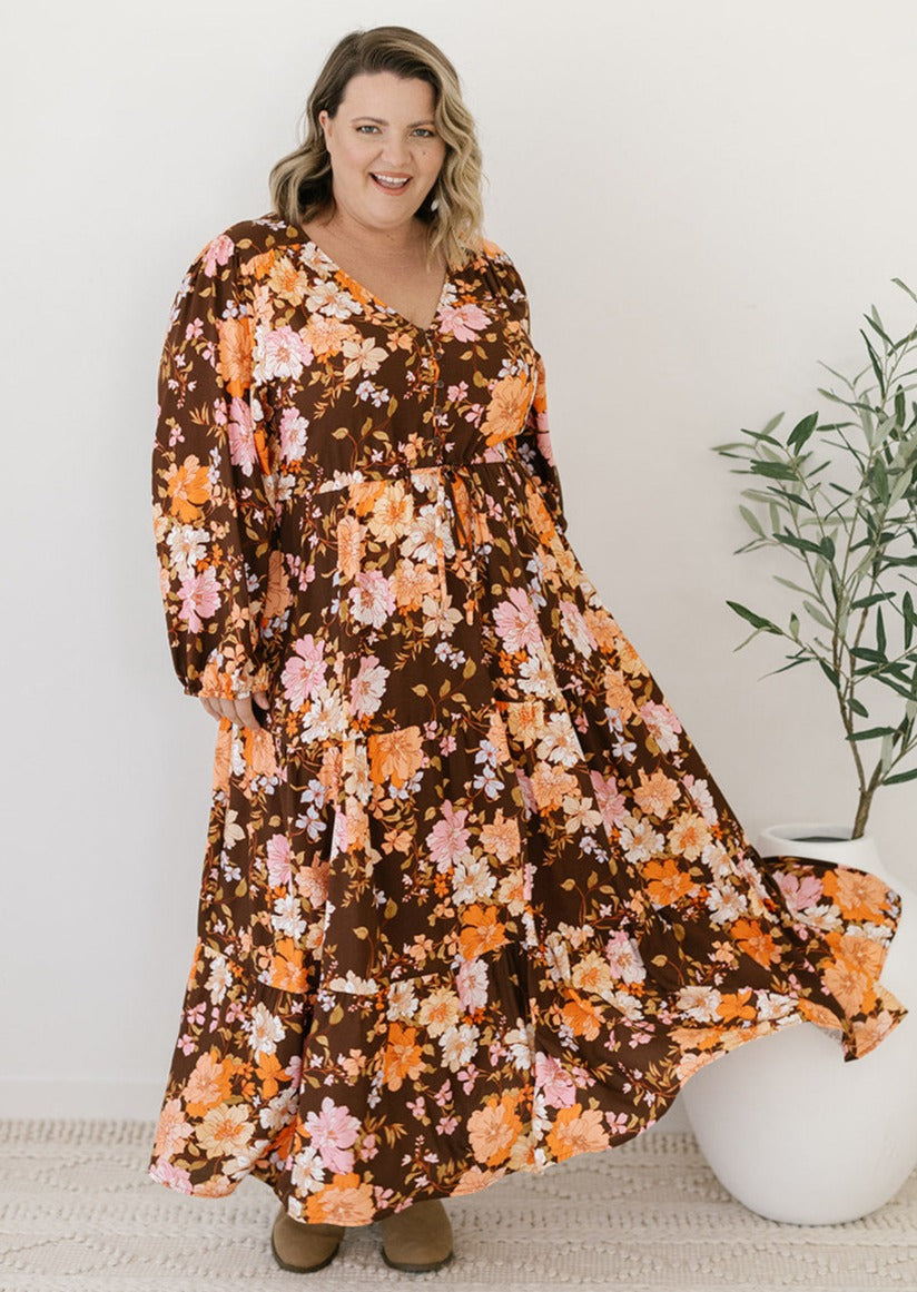 women's brown floral midi dress with drawstring waist and pockets