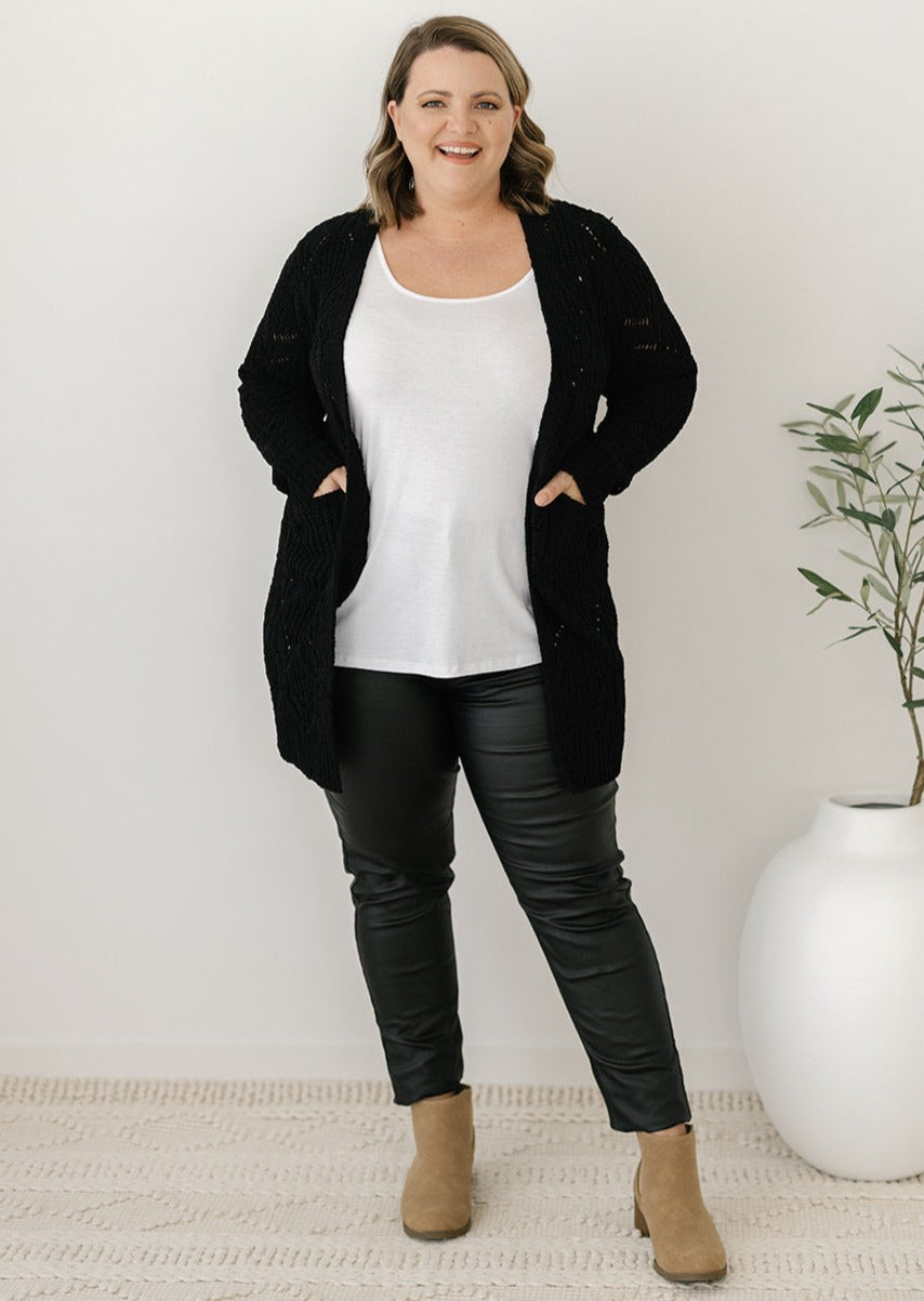 women's black cable-knit cardigan with pockets