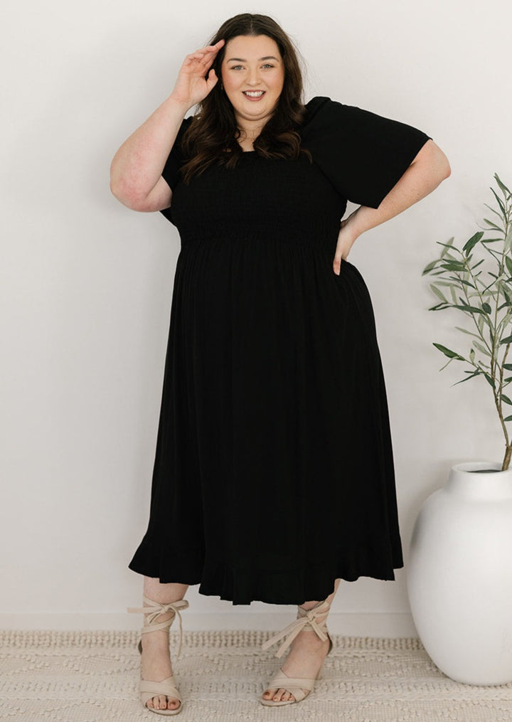 Black midi dress with shirred bodice