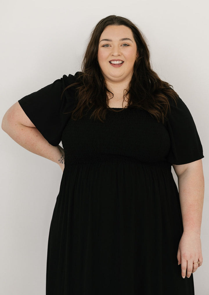 Women's black midi dress with short sleeves