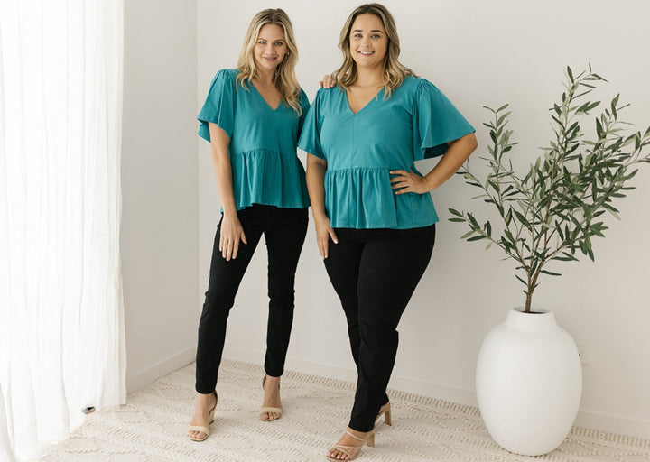 women's plus-size peplum top in teal