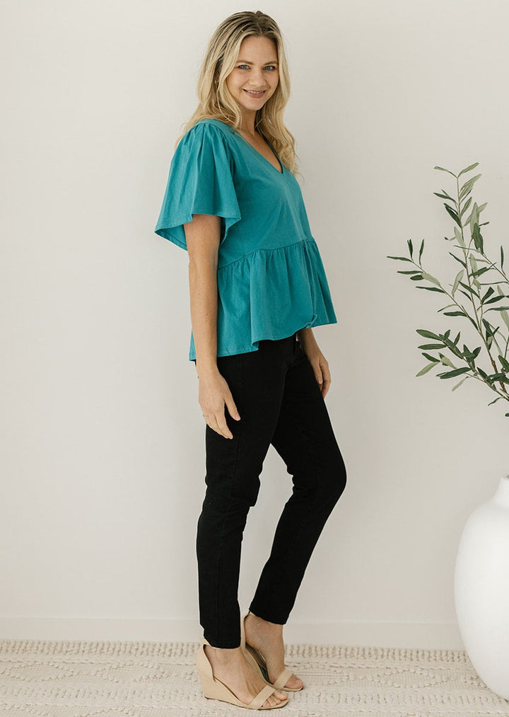 women's teal peplum-style t-shirt