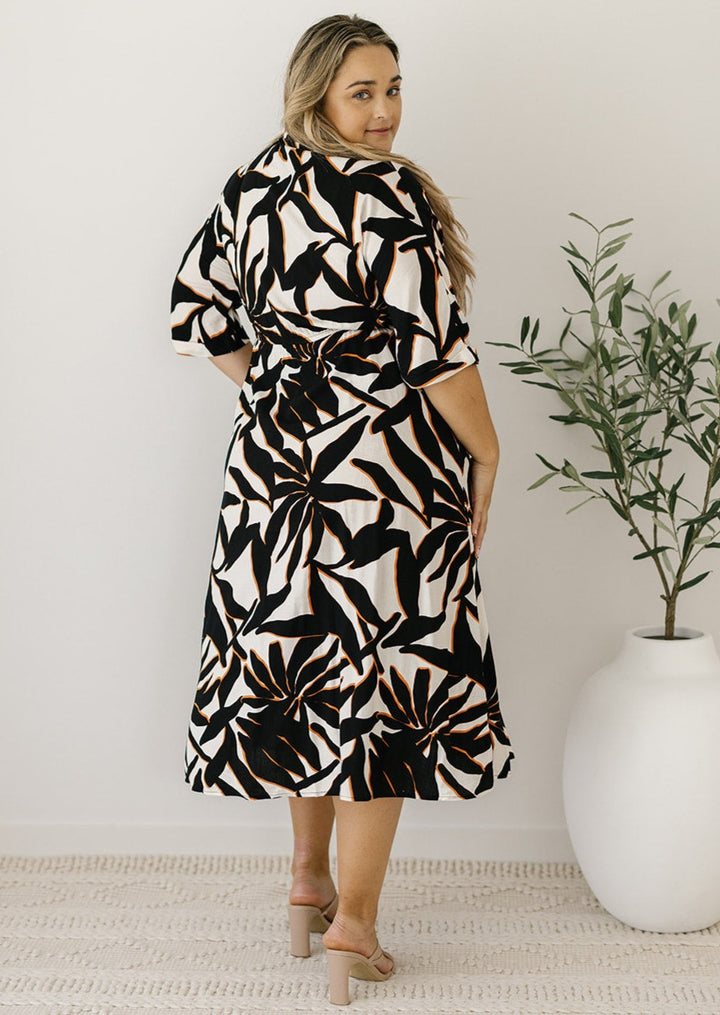 bump-friendly cream and black button-down midi dress