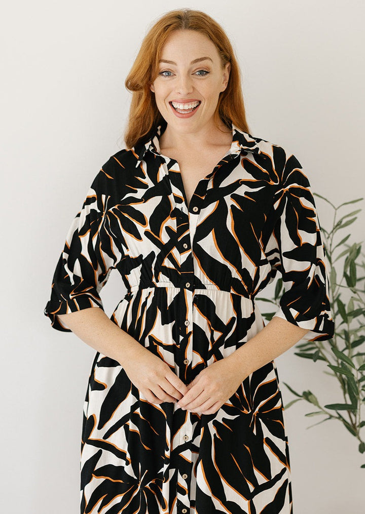 cream and black abstract button-down midi dress with pockets