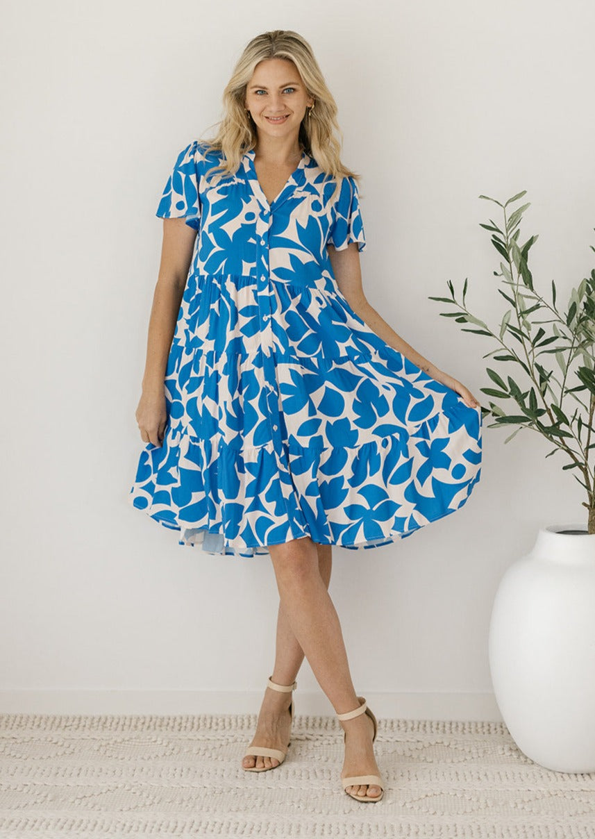 blue and white floral knee-length dress