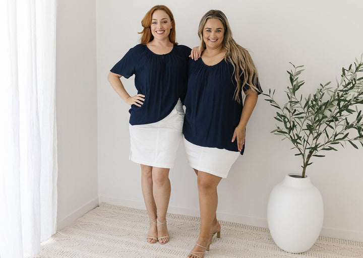 ladies navy top with front button closure