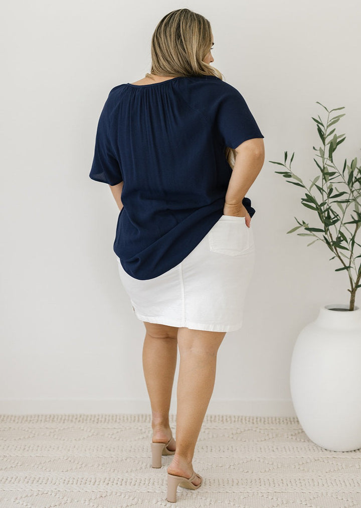 ladies block navy blouse with flutter sleeves