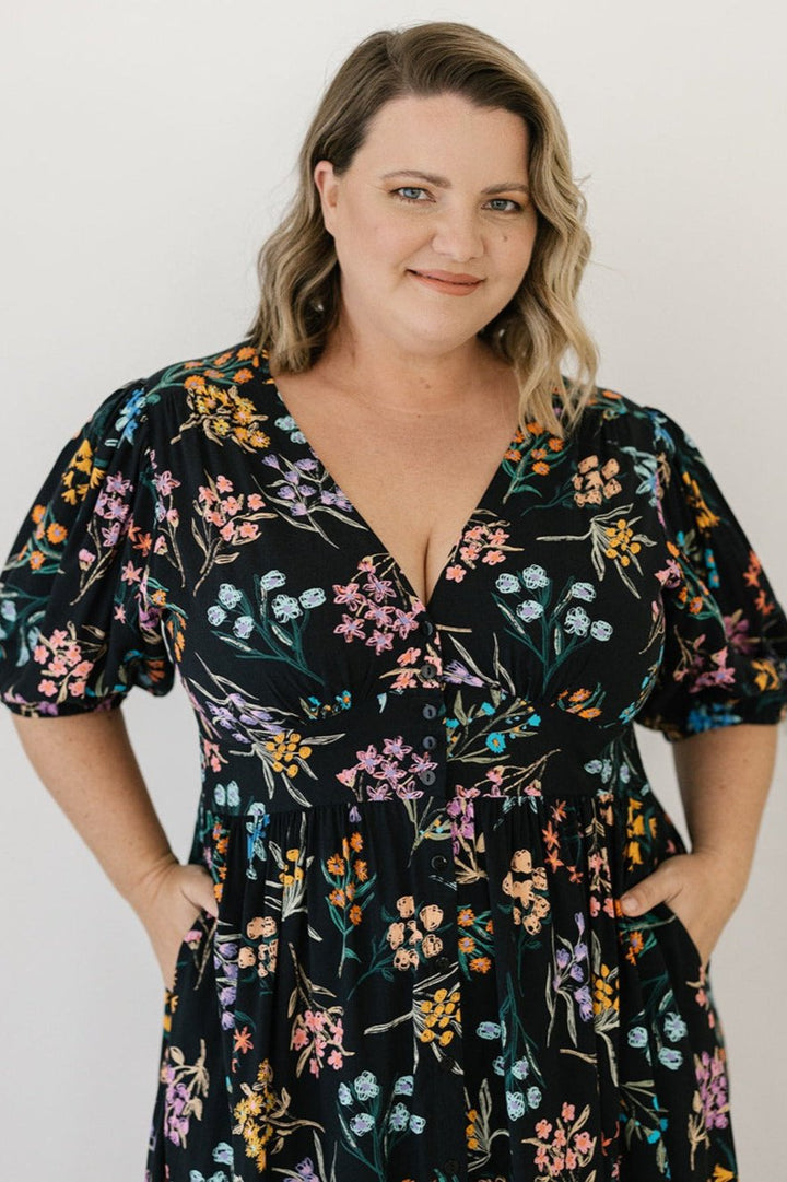 bump-friendly black and floral midi dress