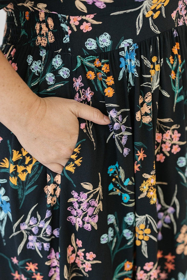 black and floral midi dress with pockets for women