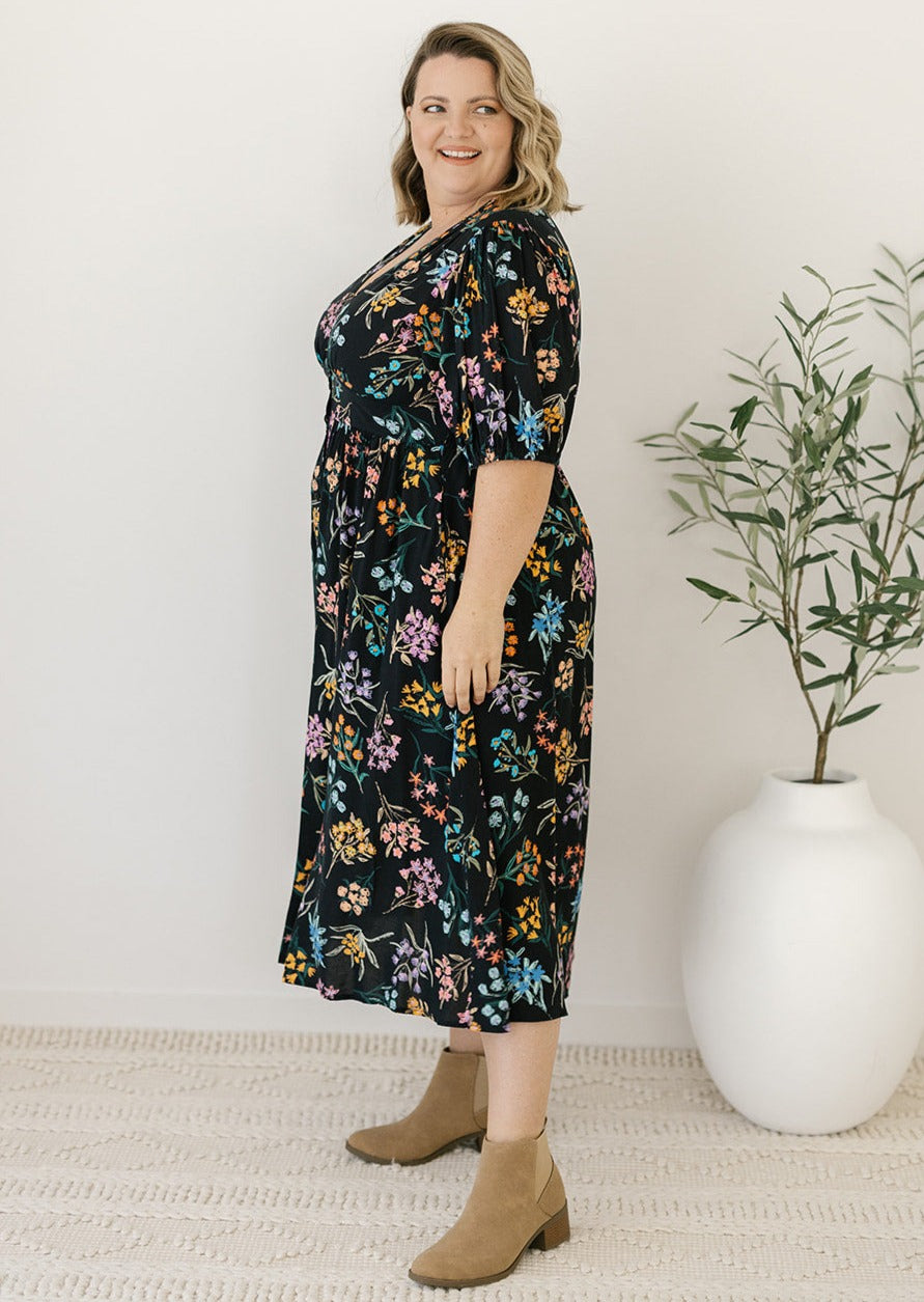 women's plus-size black floral midi dress with sleeves