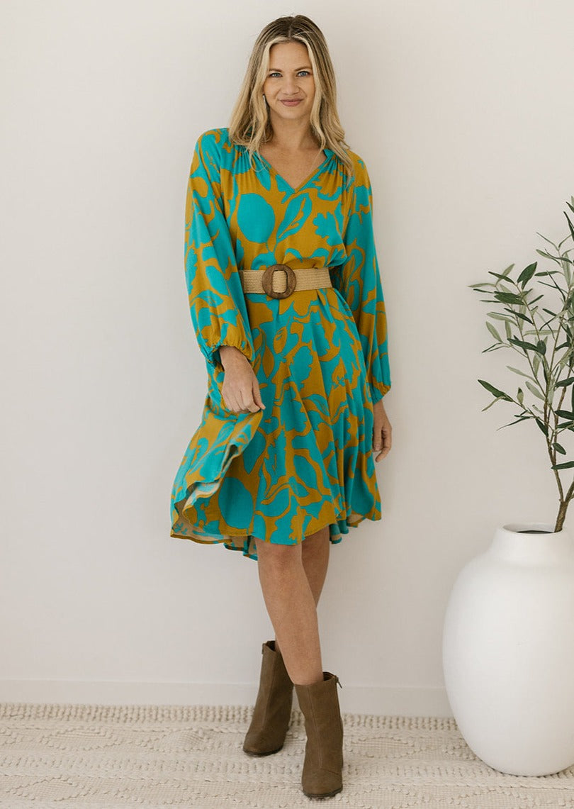 teal and mustard floral knee-length dress