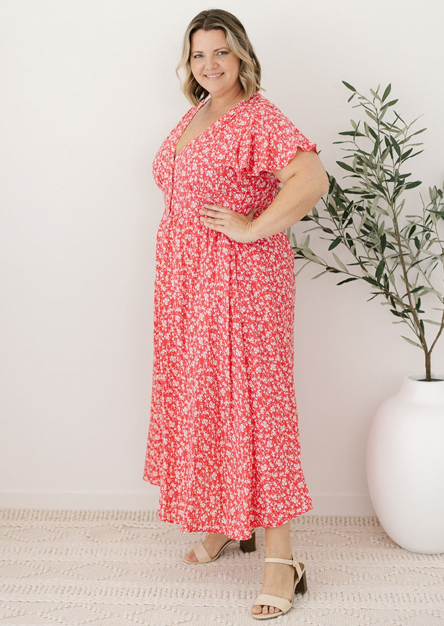 flowy pink floral midi dress with pockets