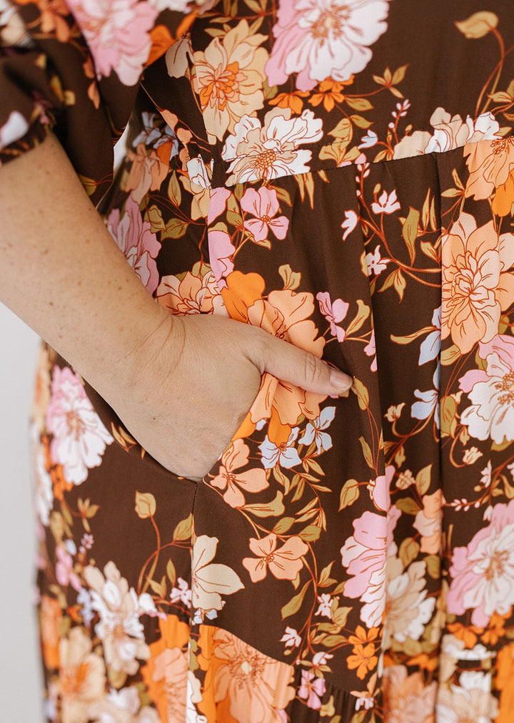 brown floral plus-size midi dress with long sleeves