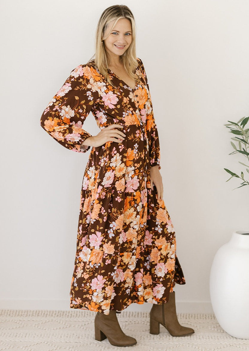 brown floral autumn midi dress with long sleeves and pockets