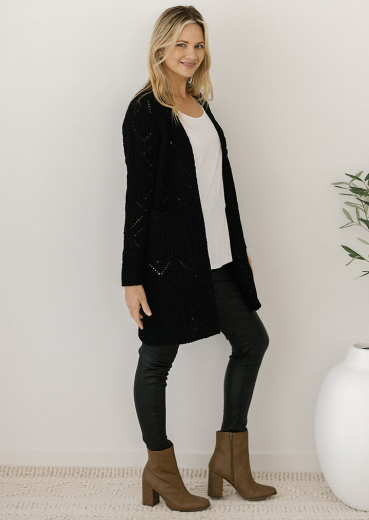 women's black cable-knit cardigan with pockets