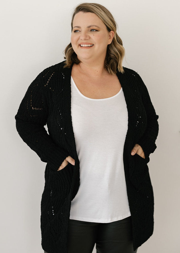 women's black cable-knit cardigan with pockets