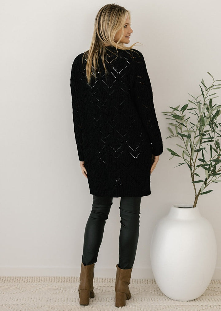 women's black cable-knit cardigan with pockets