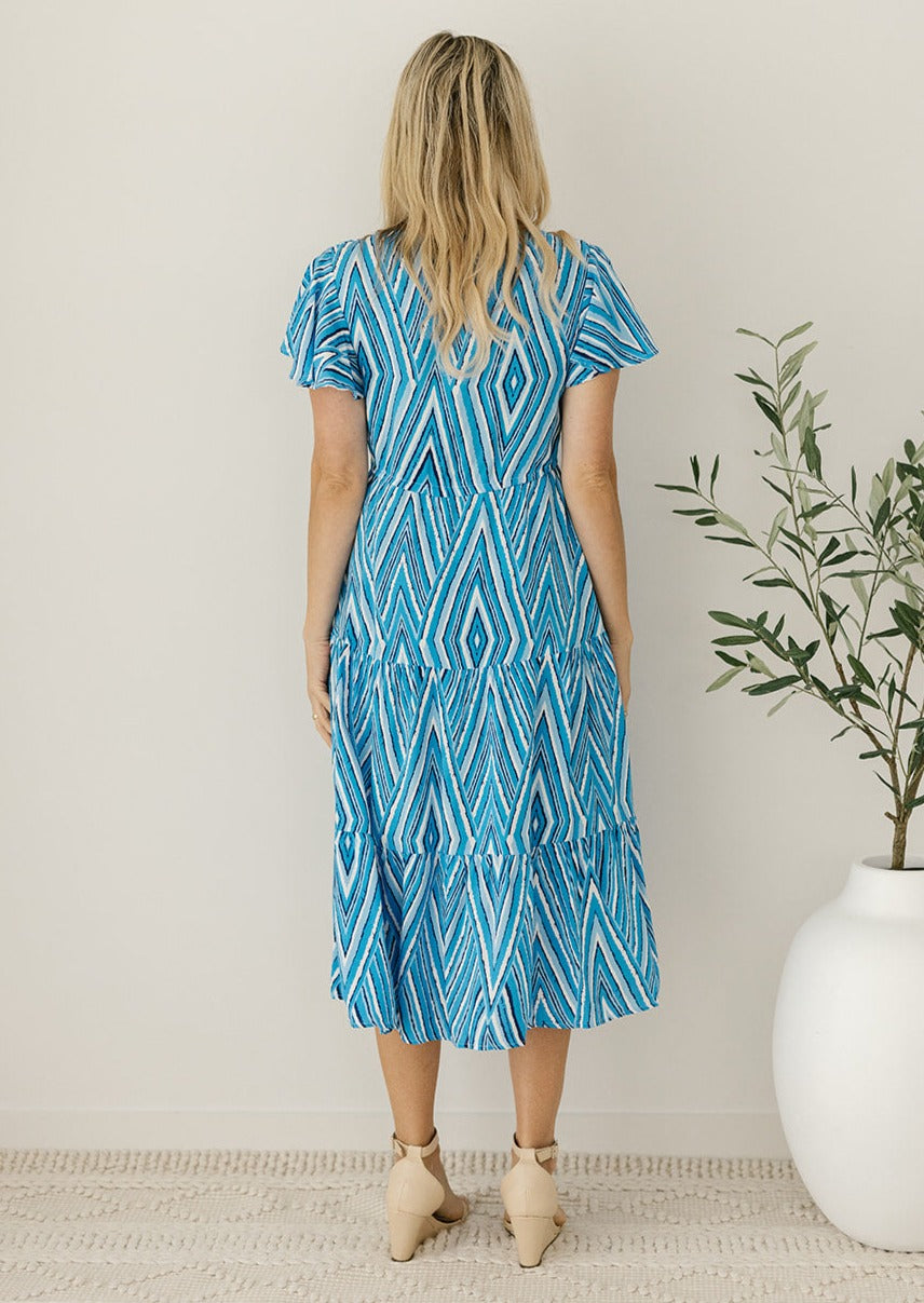 plus-size blue geometric midi dress with pockets