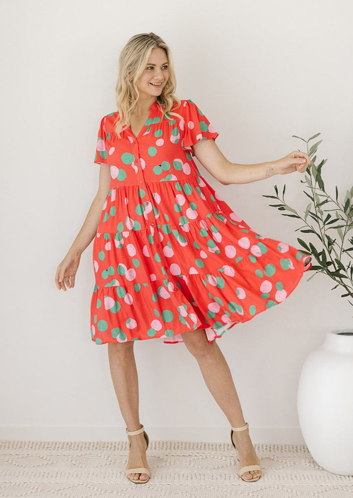 knee-length button-down red polka dot dress