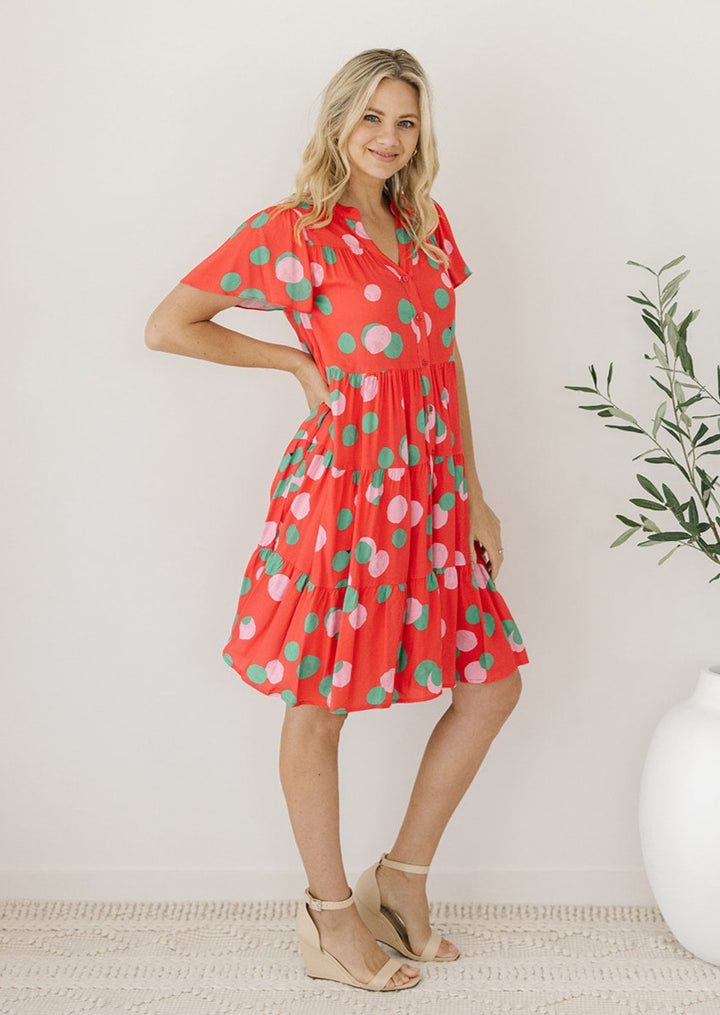 red and green polka dot button-down dress with sleeves