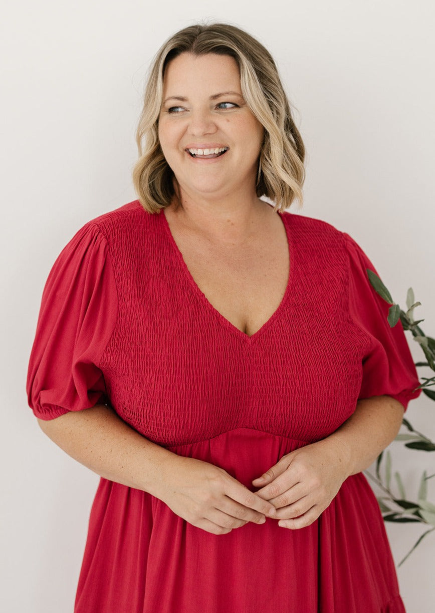 red midi dress with v-neck and pockets