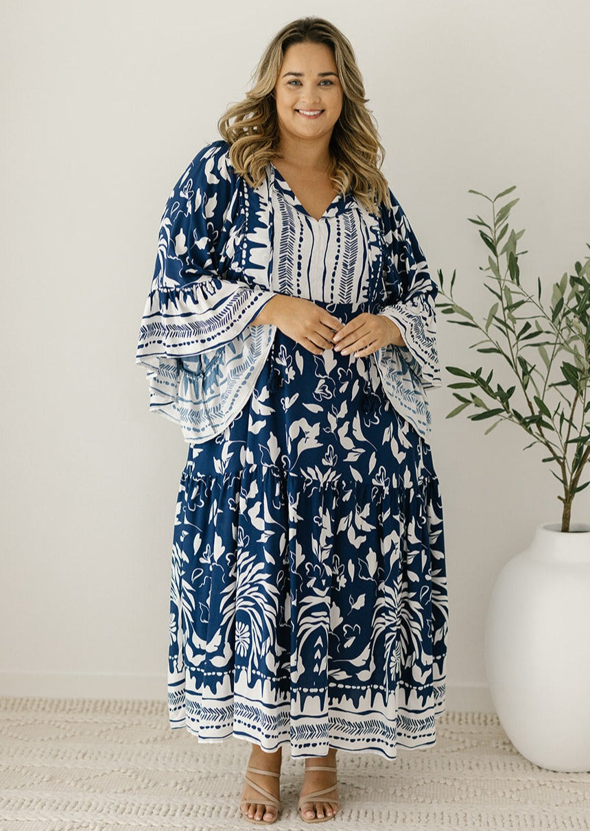 white and navy tunic-style maxi dress