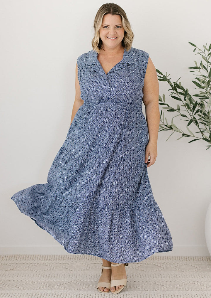 sleeveless navy and white midi dress