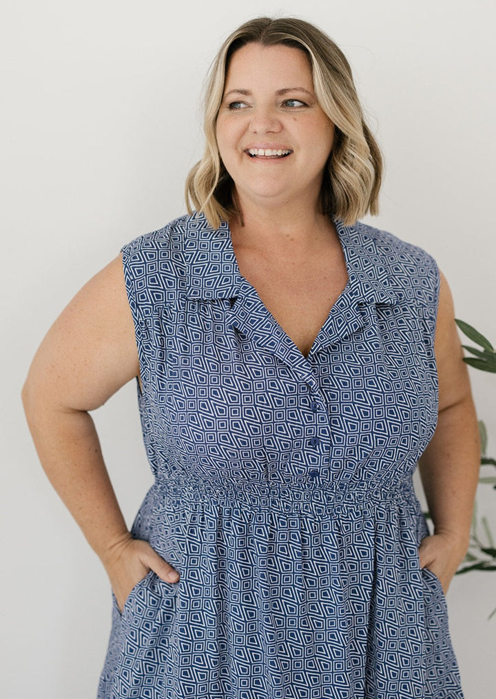 navy and white midi dress with pockets