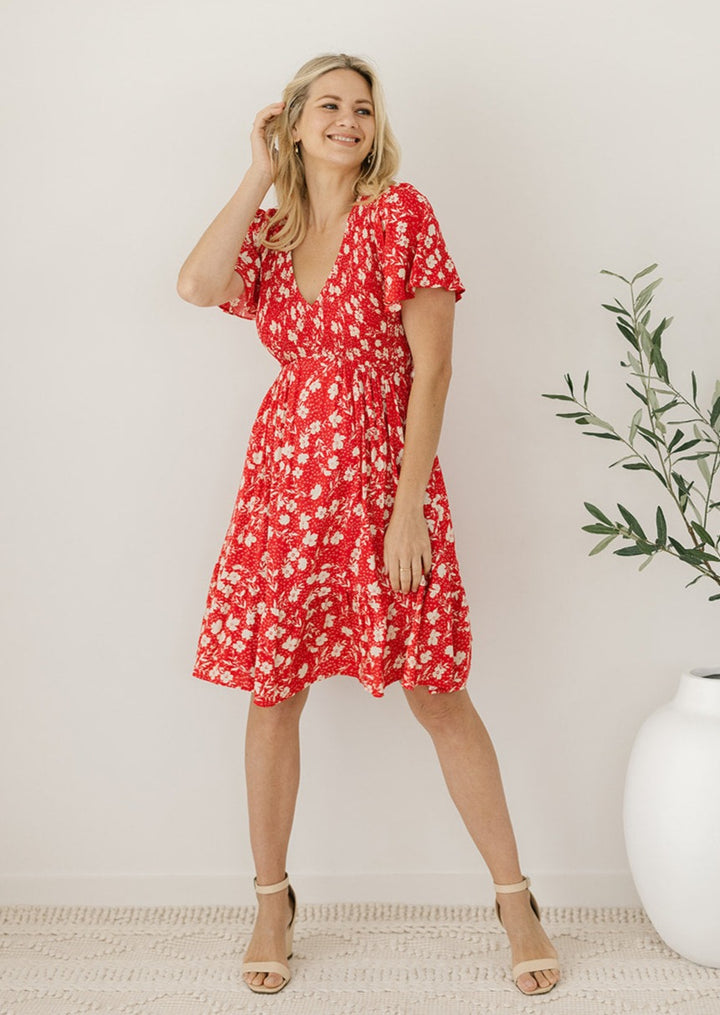 knee-length red floral dress with short sleeves