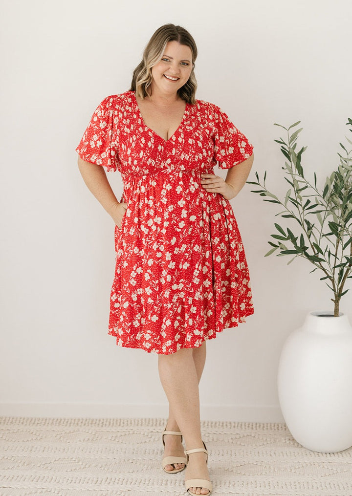 red floral knee-length shirred summer dress