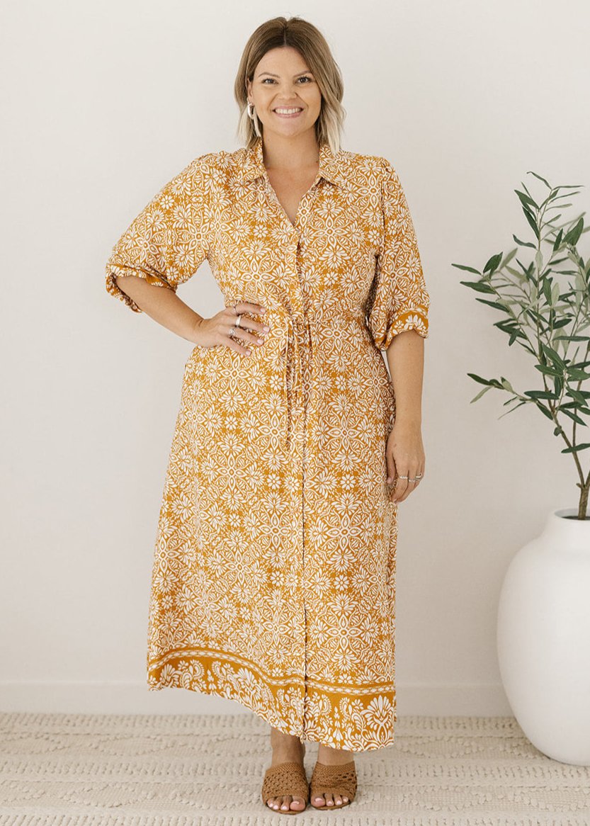 women's mustard and white floral print midi dress