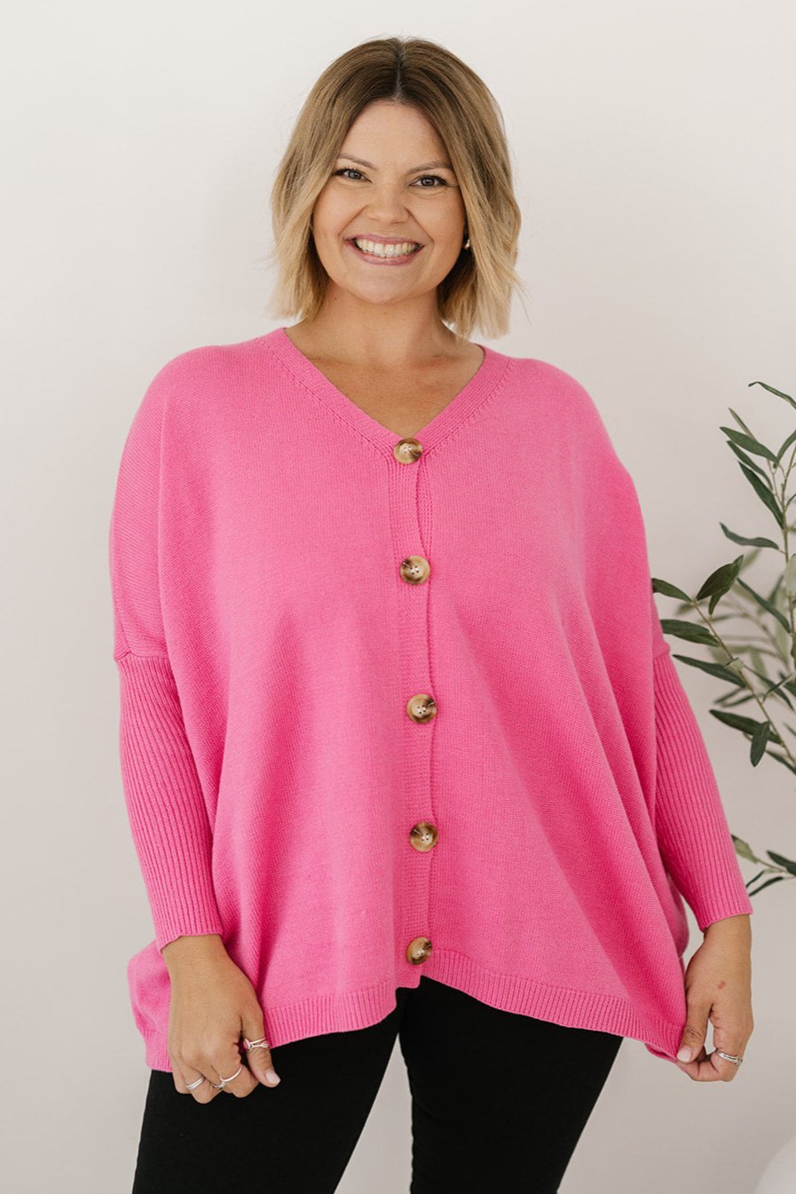 ladies oversized button-down knit jumper in hot pink