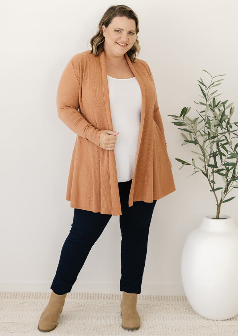 rust-coloured women's cardigan