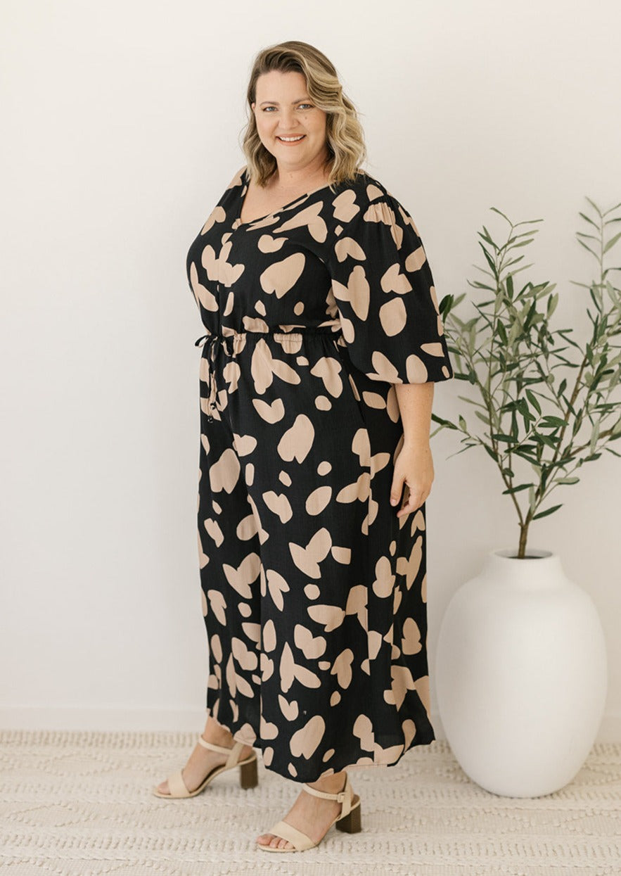 women's plus-size black abstract print jumpsuit with pockets