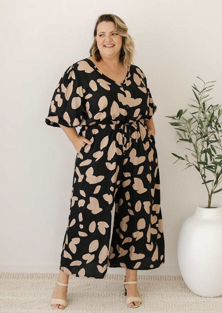 black abstract print jumpsuit with drawstring waist