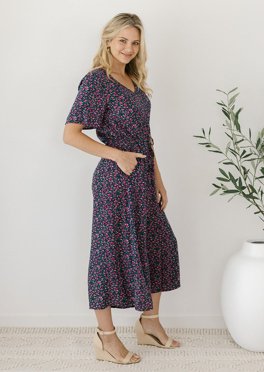 navy floral drawstring waist jumpsuit with sleeves