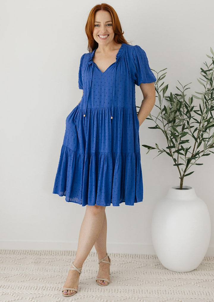blue knee-length smock dress with pockets