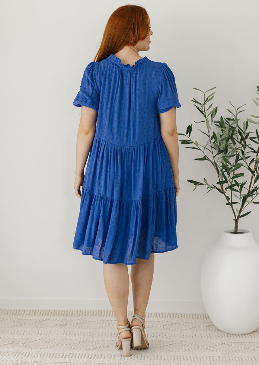 blue knee-length smock dress with pockets and lining