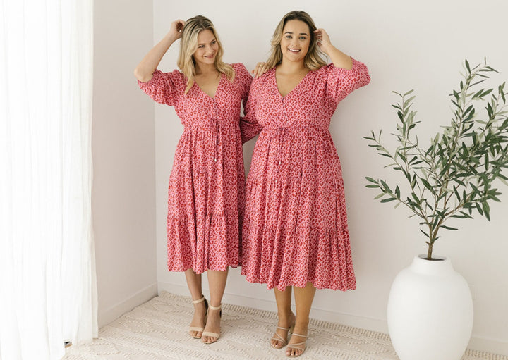 plus-size leopard print midi dress with pockets