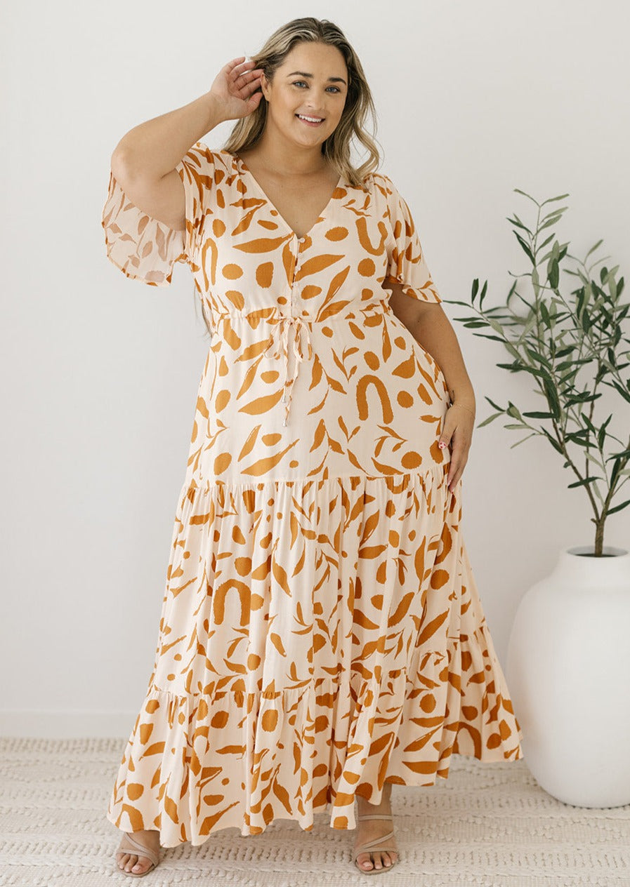 cream and tan leaf print drawstring waist maxi dress