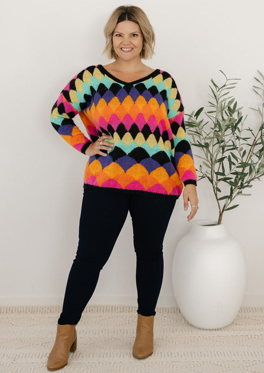 bright multicoloured abstract print knit jumper
