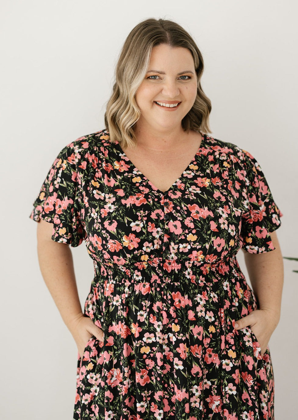 floral midi dress with pockets for plus-size women