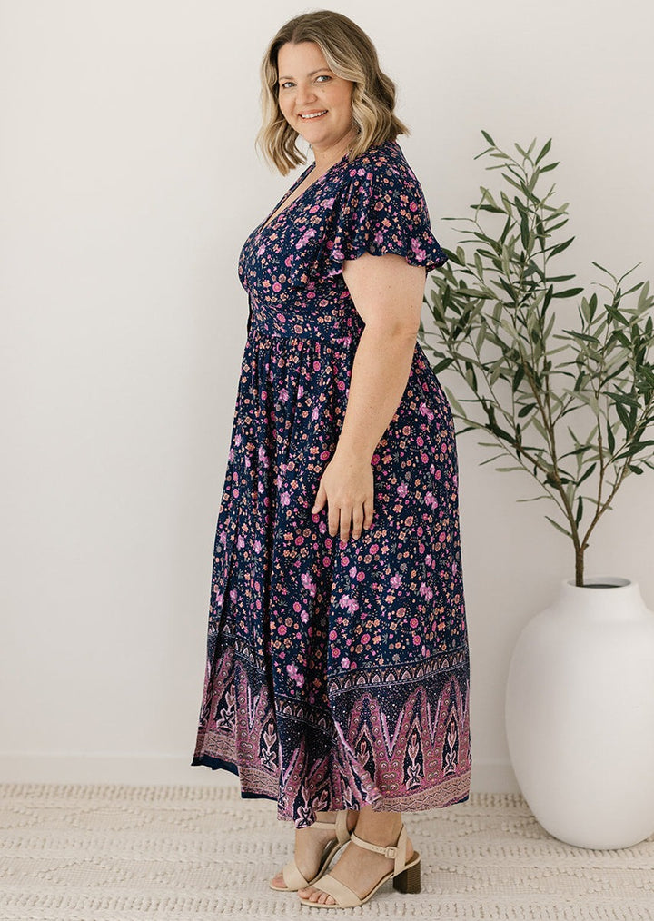 post-partum-friendly navy floral midi dress
