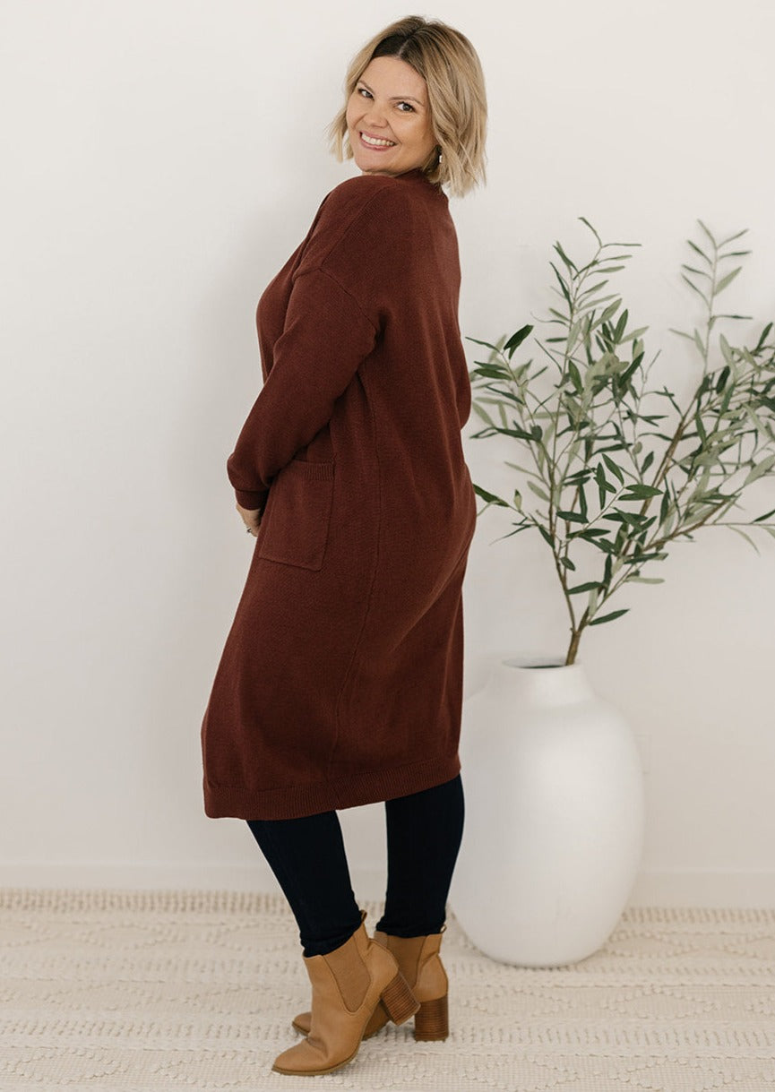 Plus-size brown knit cardigan with pockets