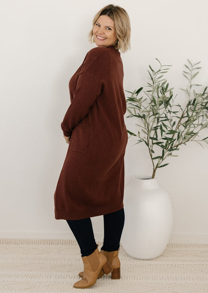 Plus-size brown knit cardigan with pockets