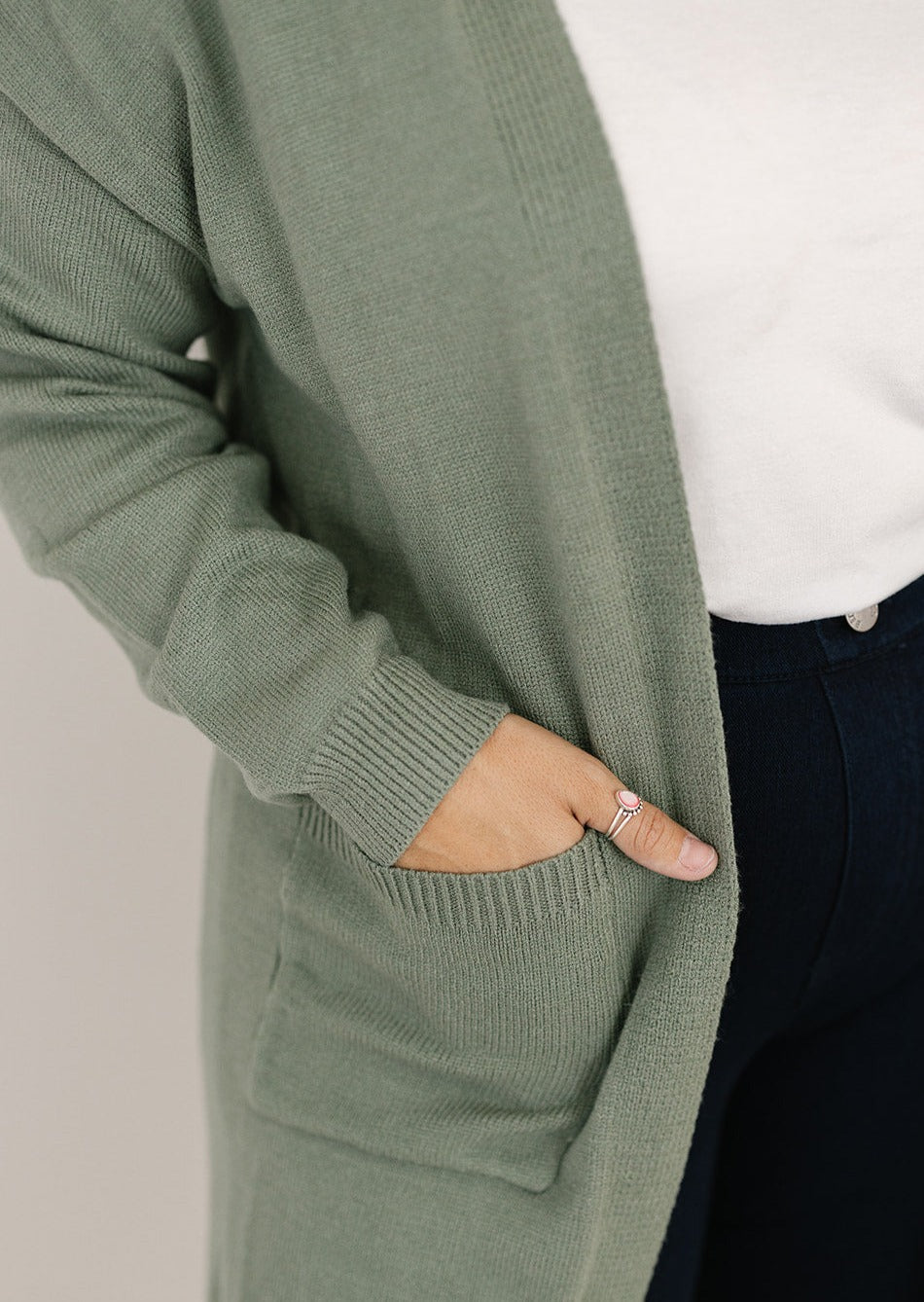 Green knit cardigan with pockets for women