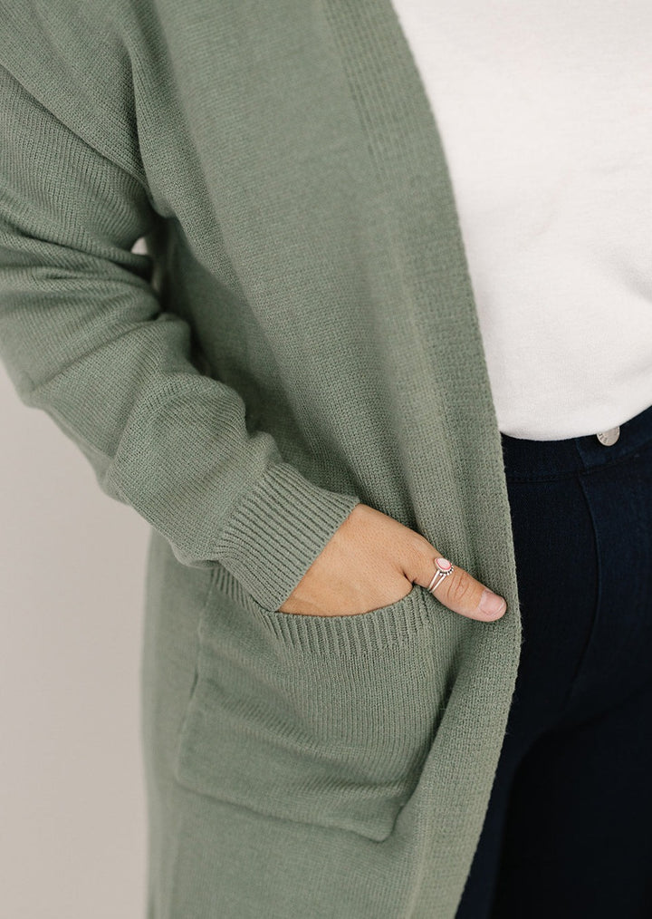 Green knit cardigan with pockets for women
