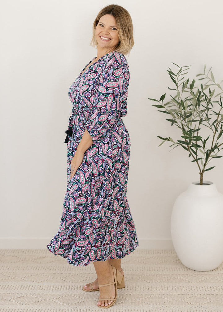 women's pink and black paisley print midi dress with pockets